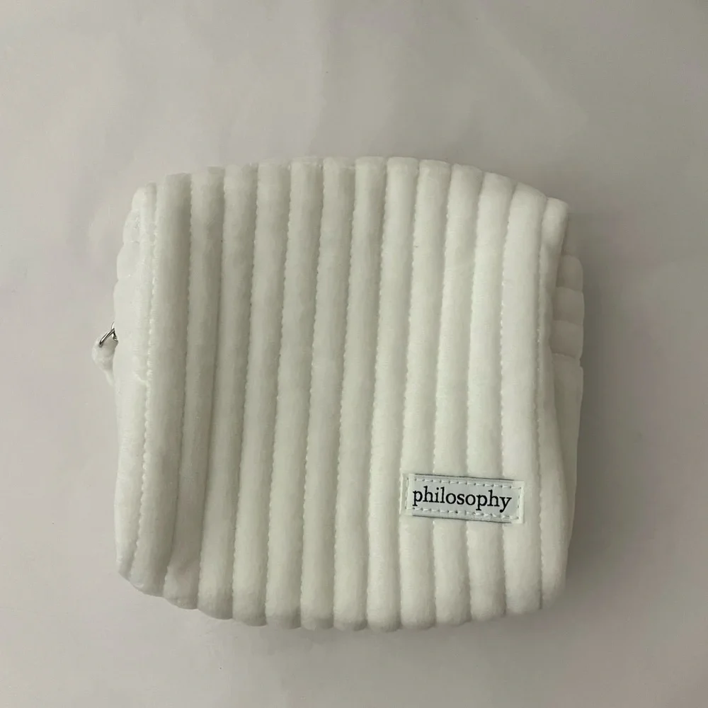 Fuzzy white philosophy cosmetics bag - empty never used